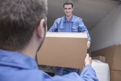Person placing boxes into Brentford storage in a tidy unit